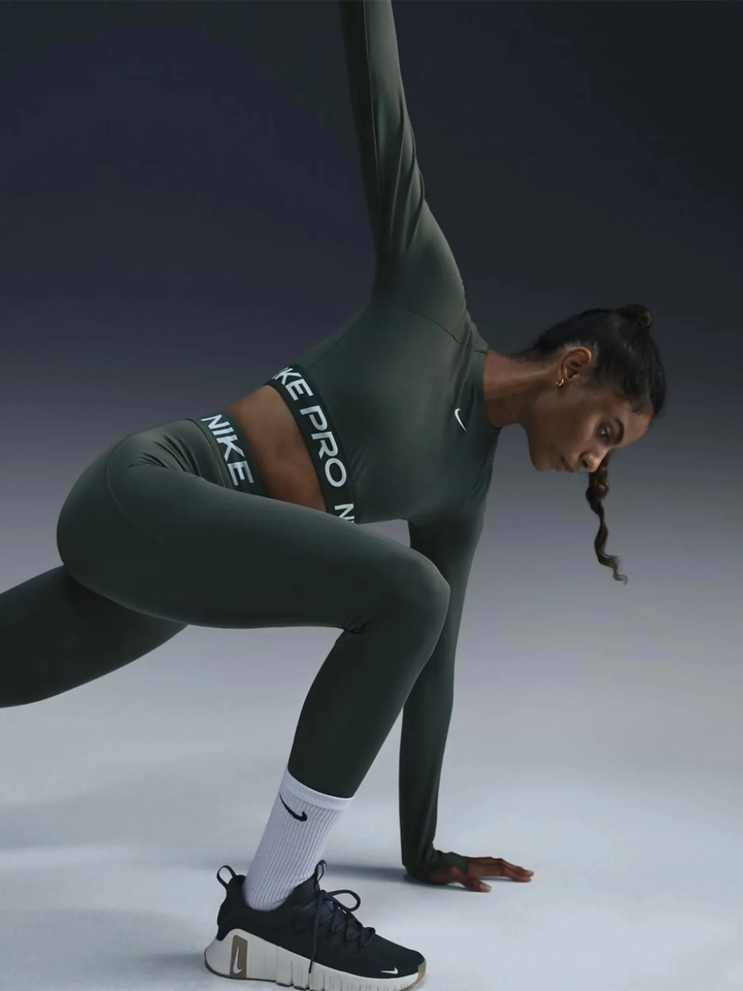 Футболка жіноча Nike NIKE PRO DF 365 CROP LS зелена FV5484-338