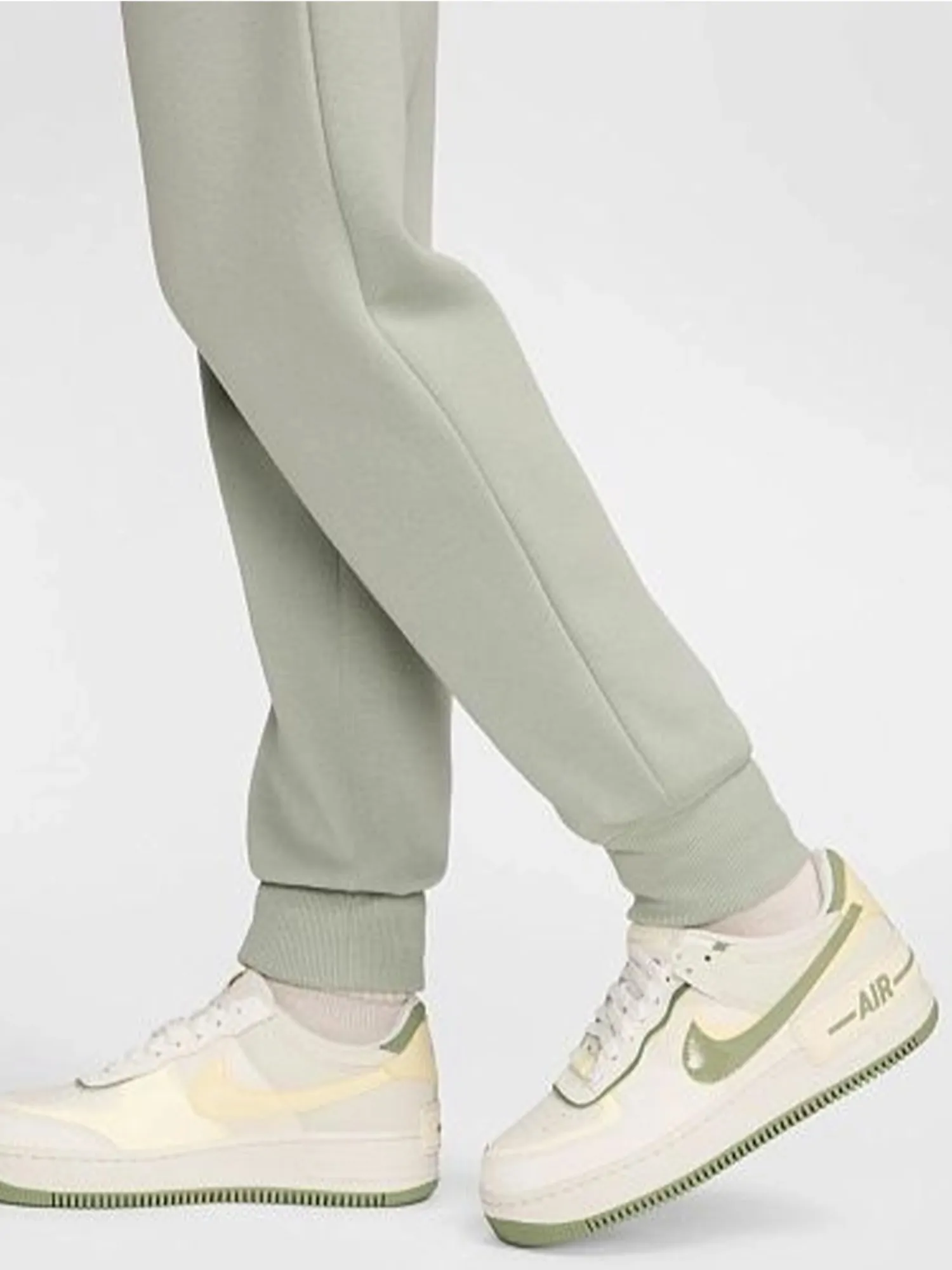 Брюки женские Nike W NSW PHNX FLC MR STD LOGO PNT зеленые HM9757