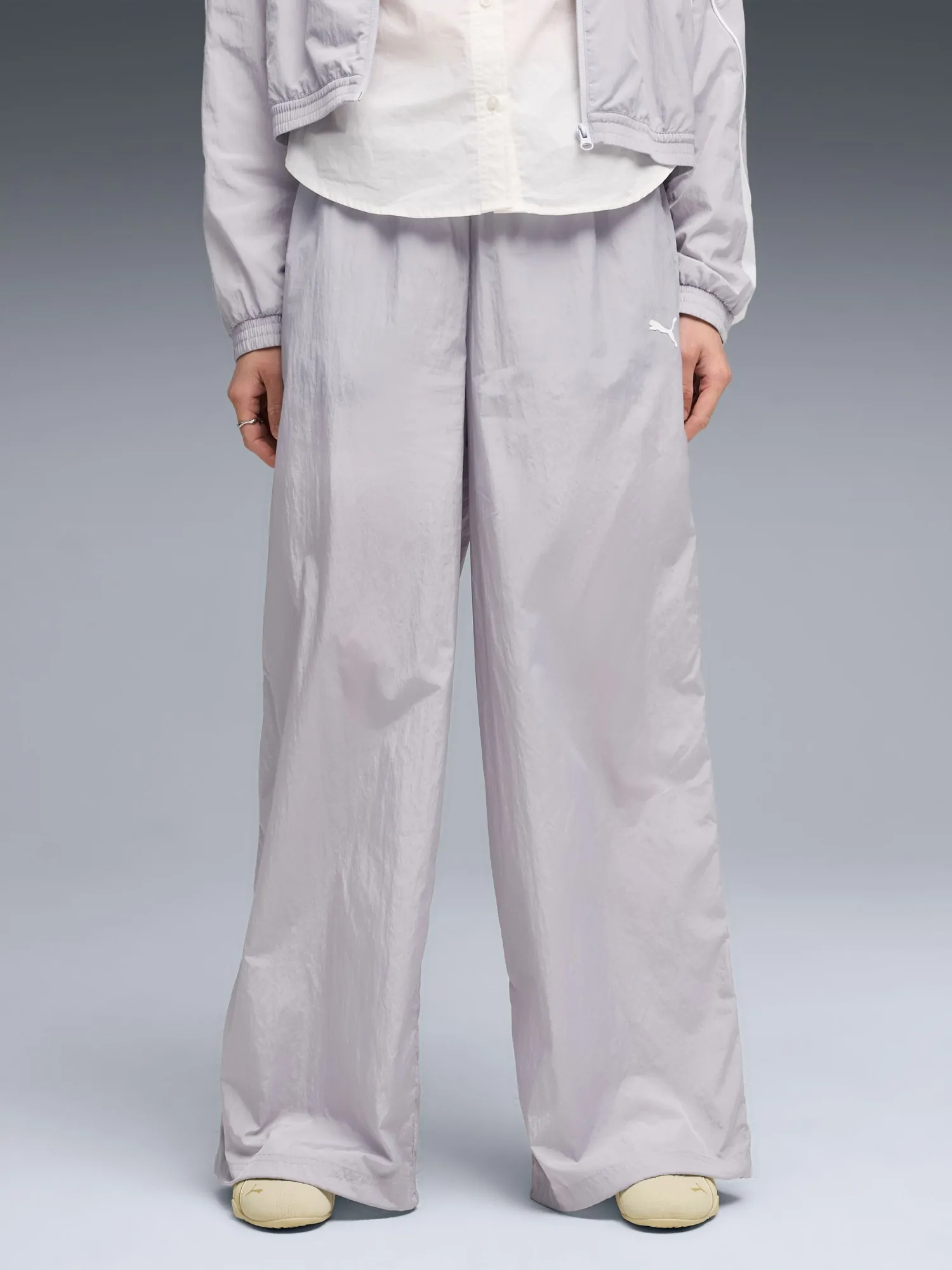 Брюки женские Puma SPORT Relaxed Woven Pants op сиреневые 69186582