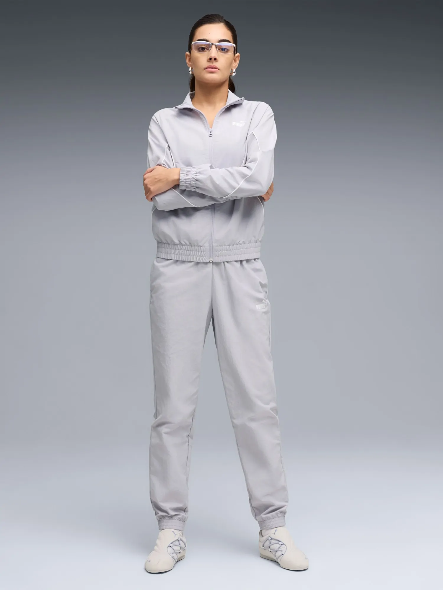 Костюм женский Puma Woven Tracksuit cl сиреневый 69190782 купить в