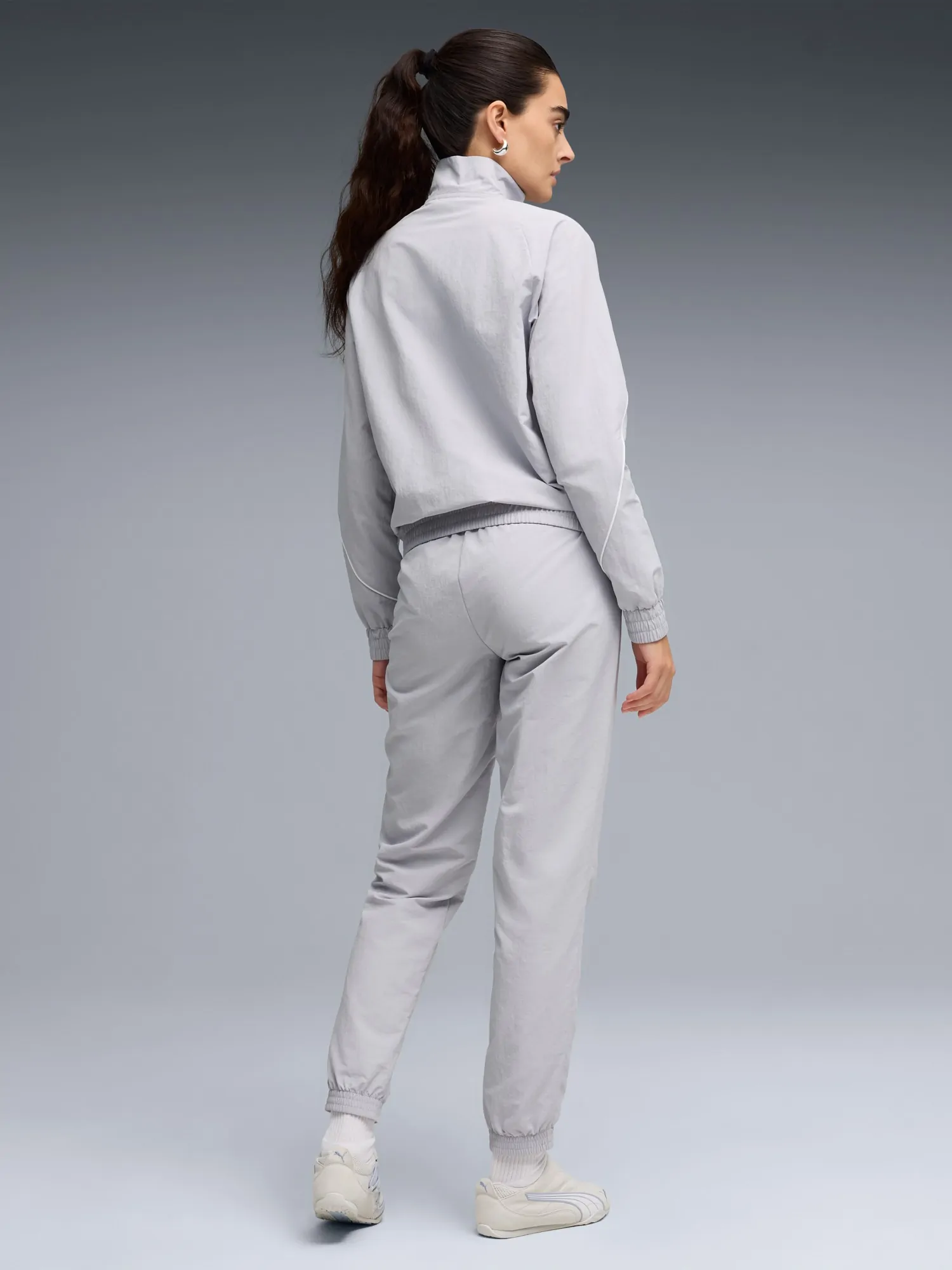 Костюм женский Puma Woven Tracksuit cl сиреневый 69190782 купить в