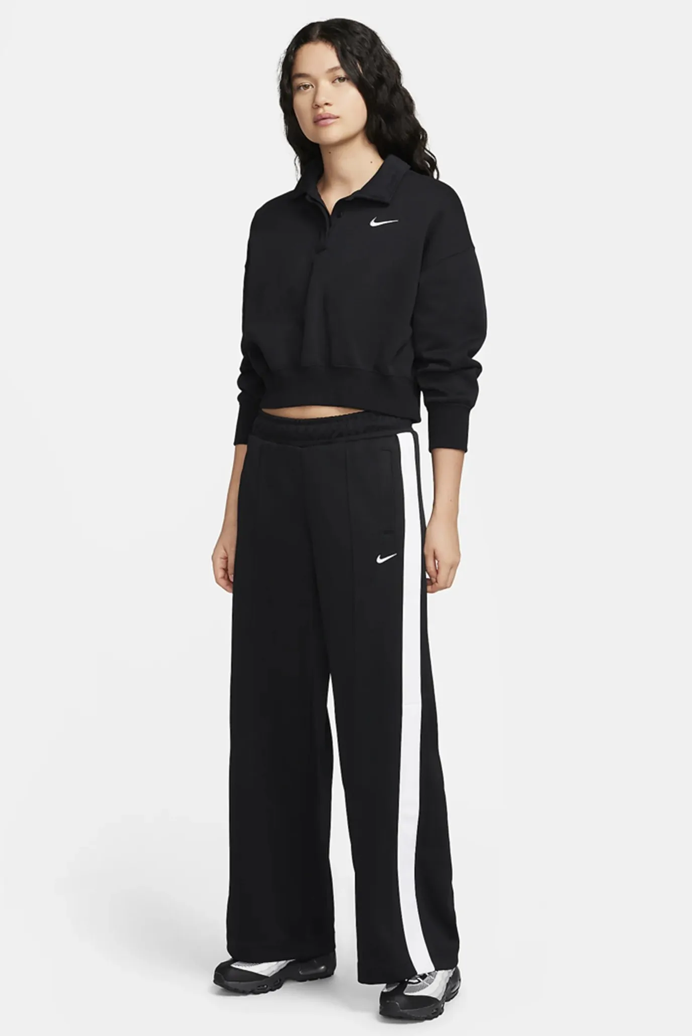 Штани жіночі Nike W NSW PK PANT SW чорні FZ7279-010 купити в Києві