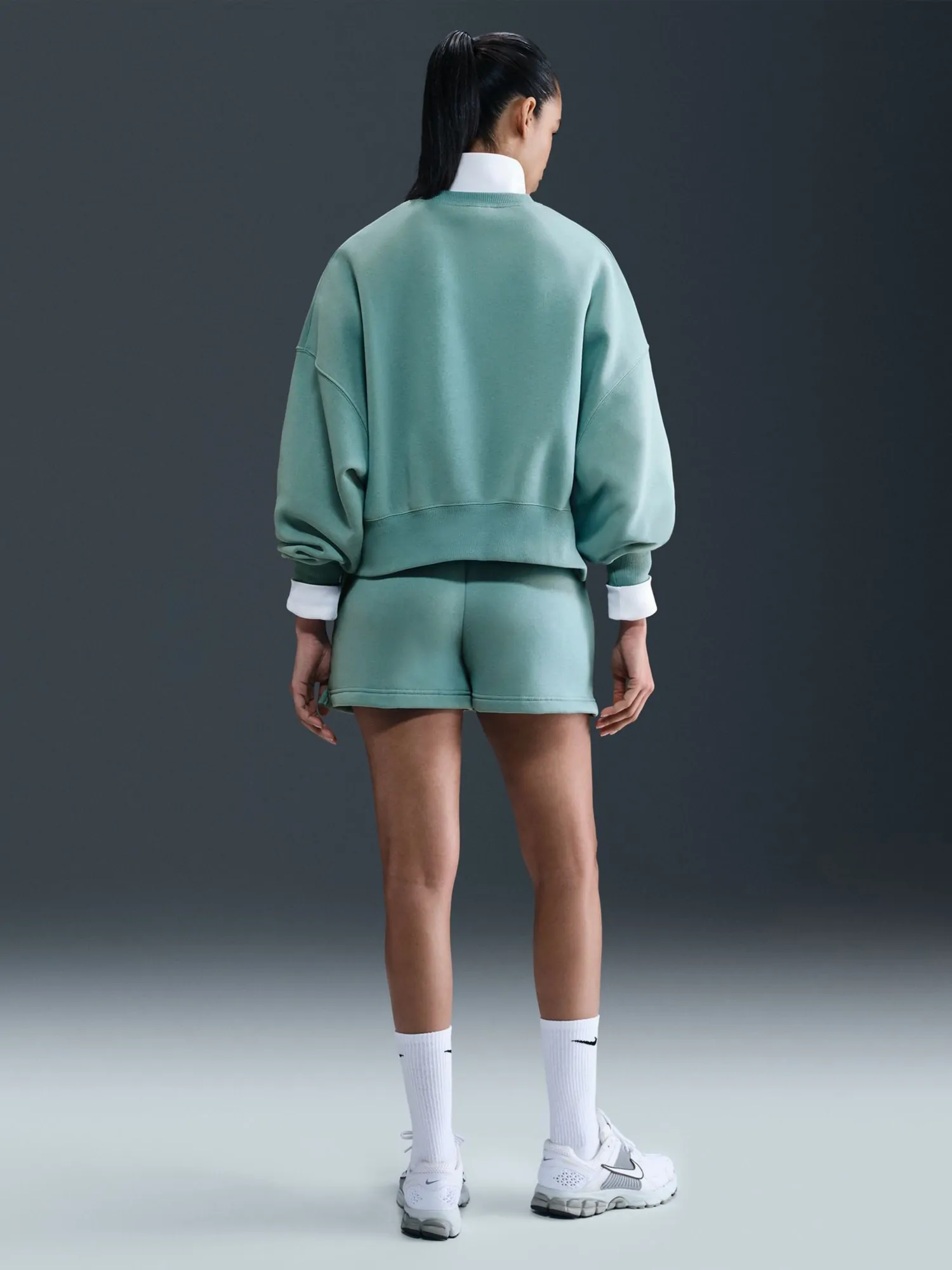 なお Толстовка женская Nike W NSW PHNX FLC OOS CREW бирюзовая DQ5761