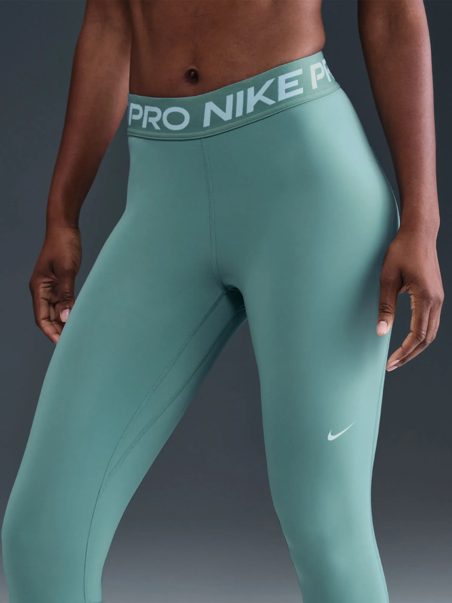 Легінси жіночі Nike W NP 365 TIGHT бірюзові CZ9779-027 купити в