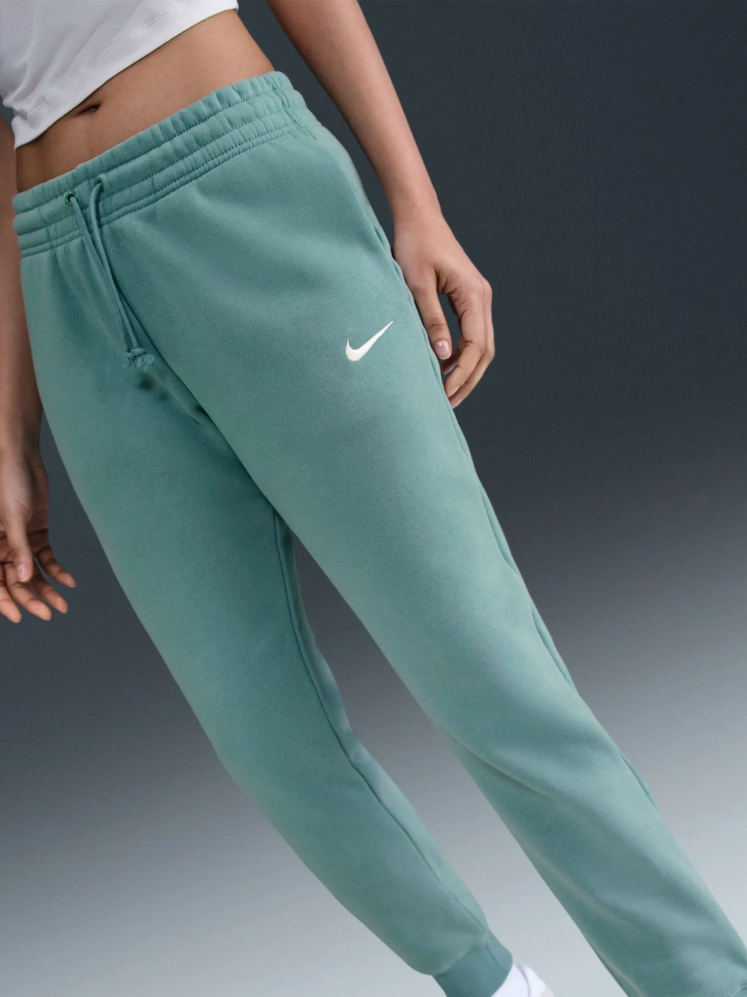 Брюки женские Nike W NSW PHNX FLC MR PANT STD бирюзовые FZ7626-017