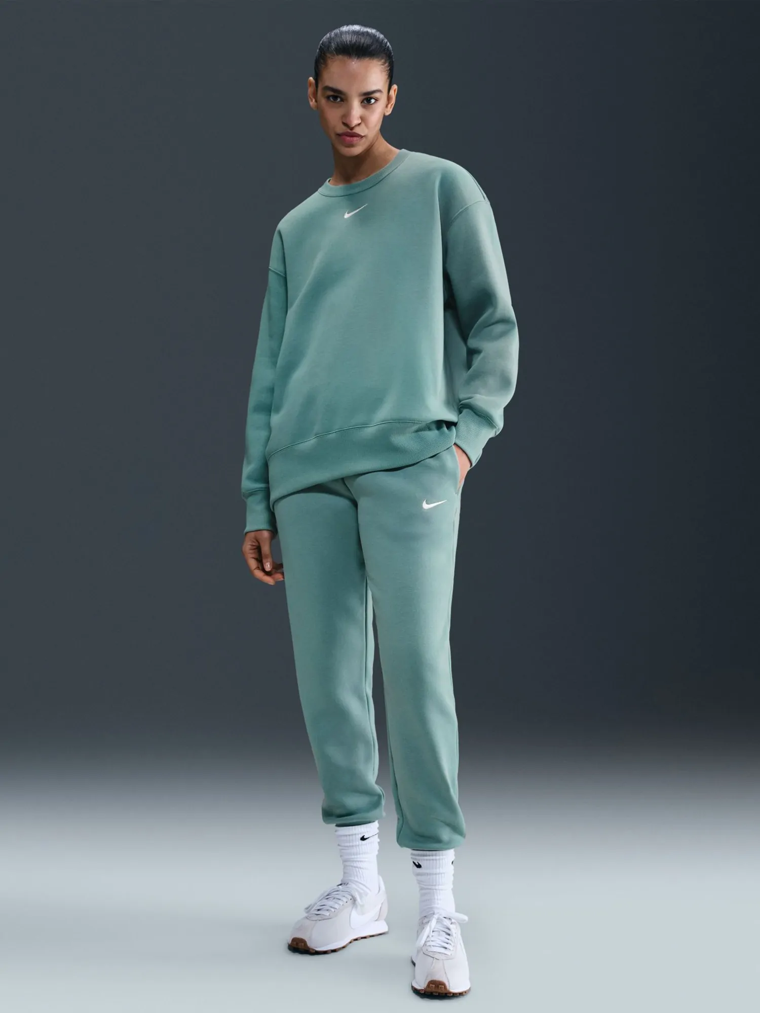 Брюки женские Nike W NSW PHNX FLC MR PANT STD бирюзовые FZ7626-017