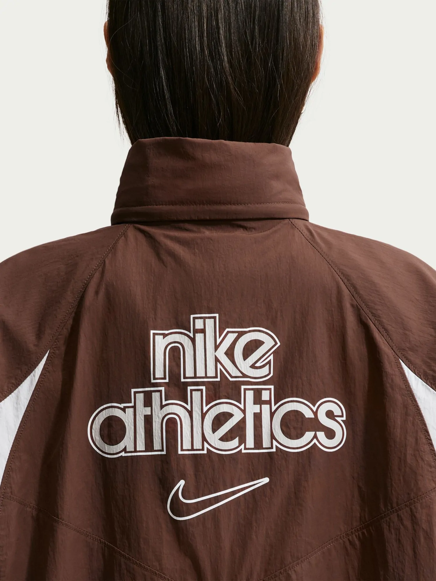 Вітрівка жіноча Nike W NSW WVN JACKET GLS коричнева IO1300-216