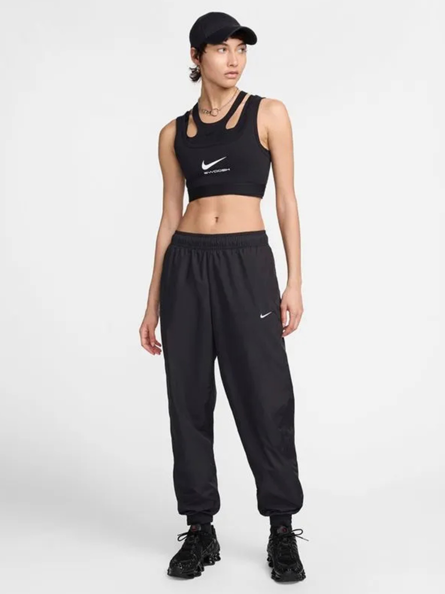 Брюки женские Nike W NSW OTG UV ESSNTL WVN MR JG черные FV7660-010 изображение 4