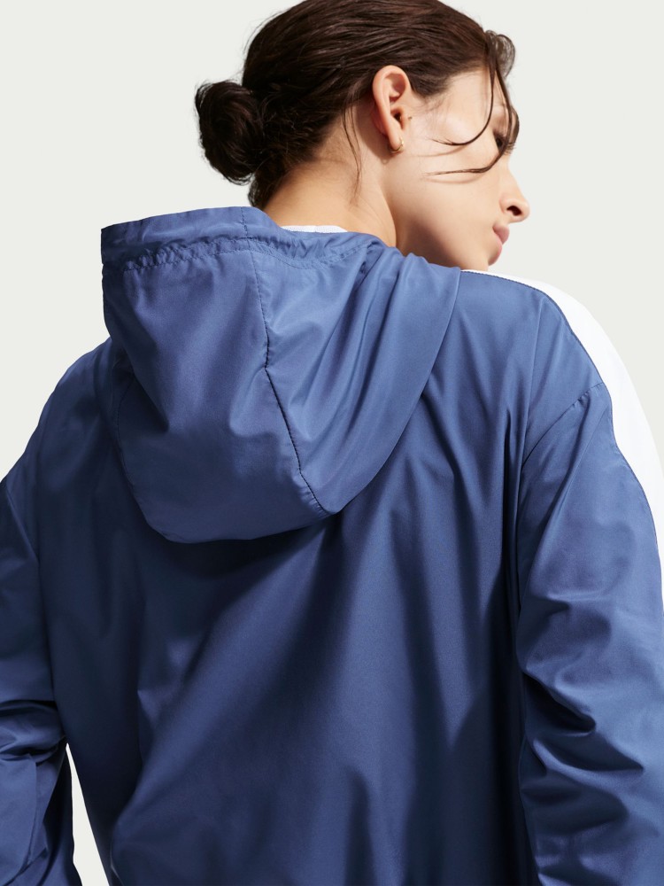 Ветровка женская Nike W NSW ESSNTL UV WVN JKT HD синяя FV6298-461 изображение 5