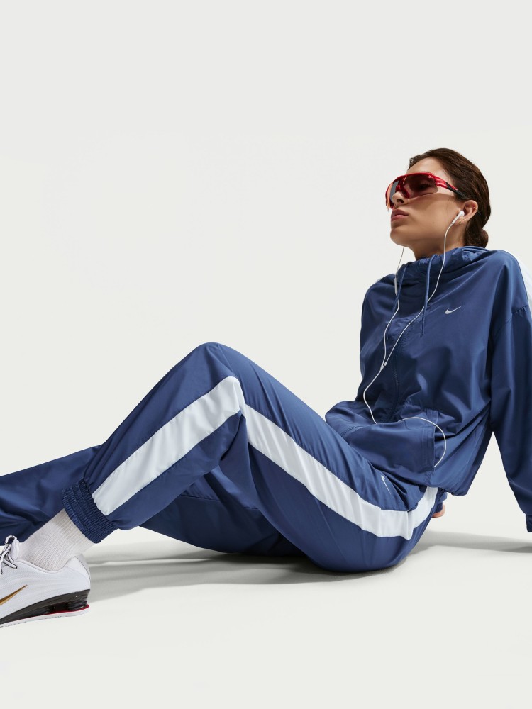 Штани жіночі Nike W NSW OTG UV ESSNTL WVN MR JG сині FV7660-461 изображение 4