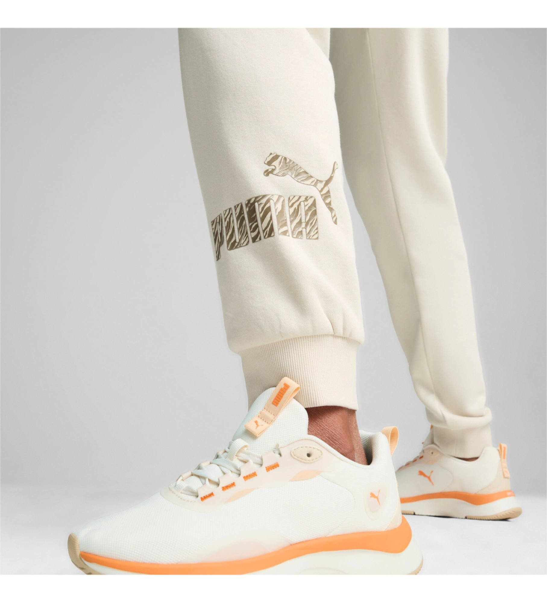 Штани жіночі Puma ESS+ ANIMAL Pants FL молочні 68149687 изображение 5