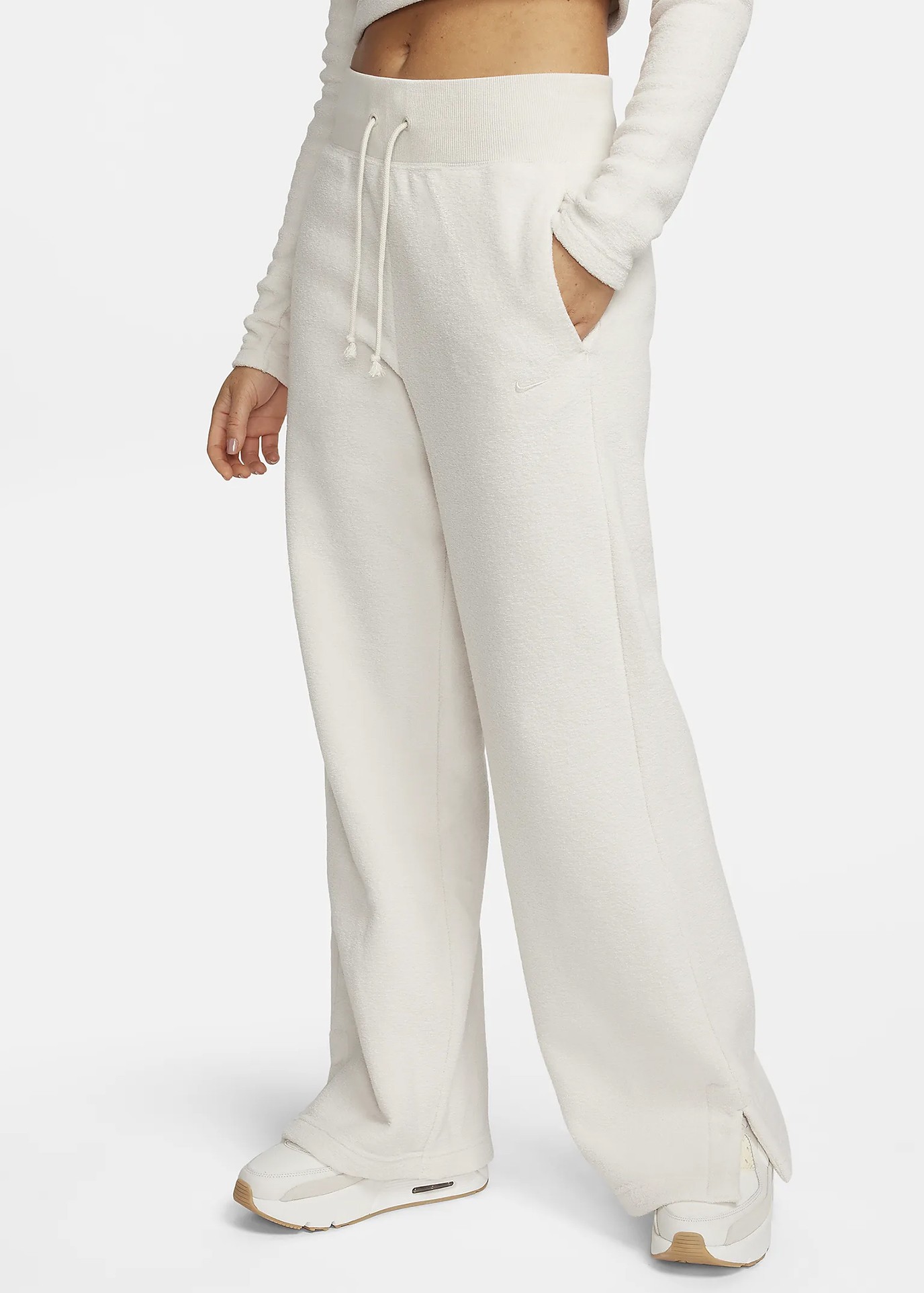 Штани жіночі Nike W NSW PHNX PLSH HR PANT WIDE бежеві FN3622-104 изображение 2