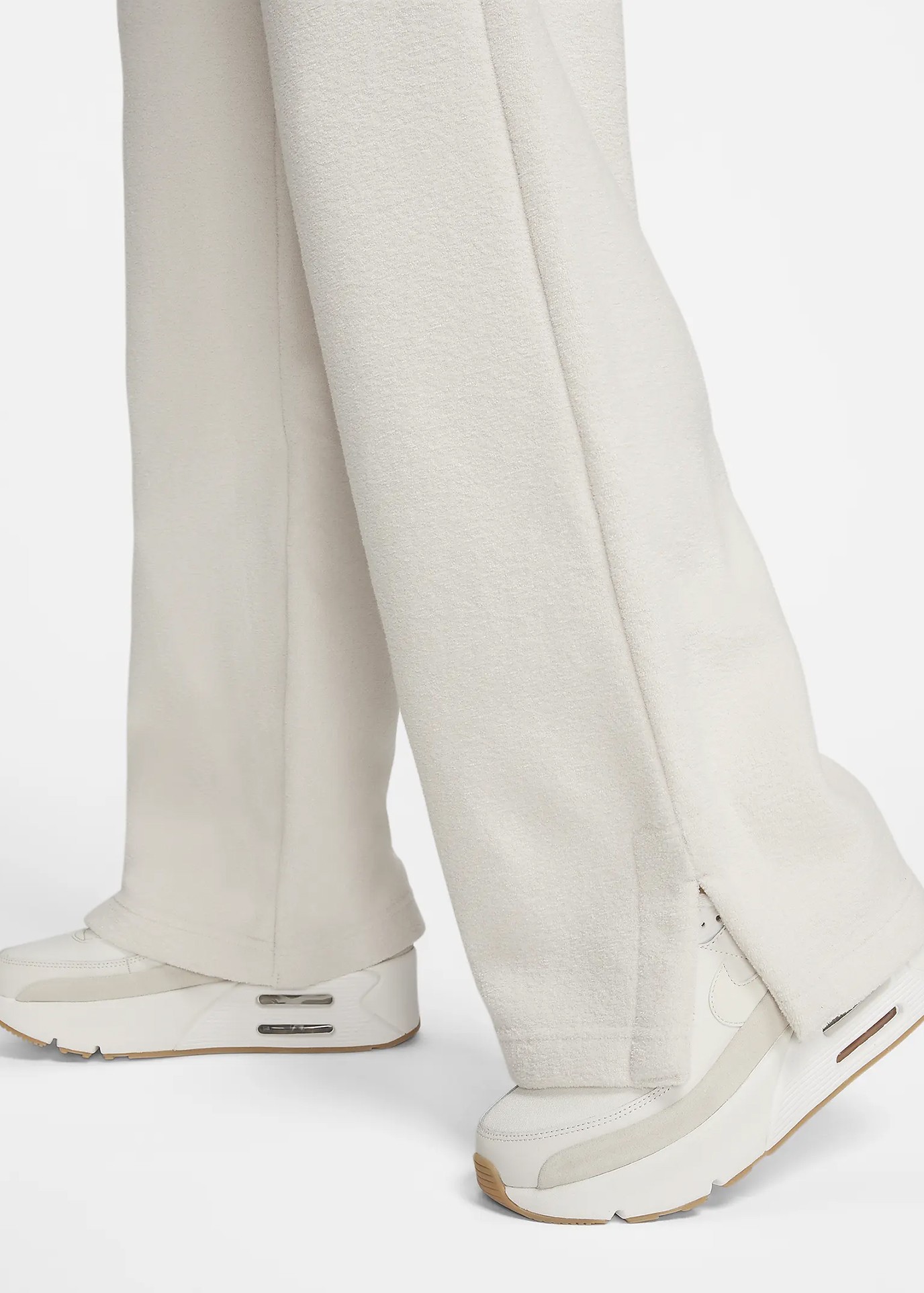 Штани жіночі Nike W NSW PHNX PLSH HR PANT WIDE бежеві FN3622-104 изображение 5