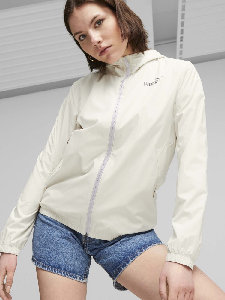 Ветровка женская Puma ESS Solid Windbreaker молочная 84749487 изображение 2