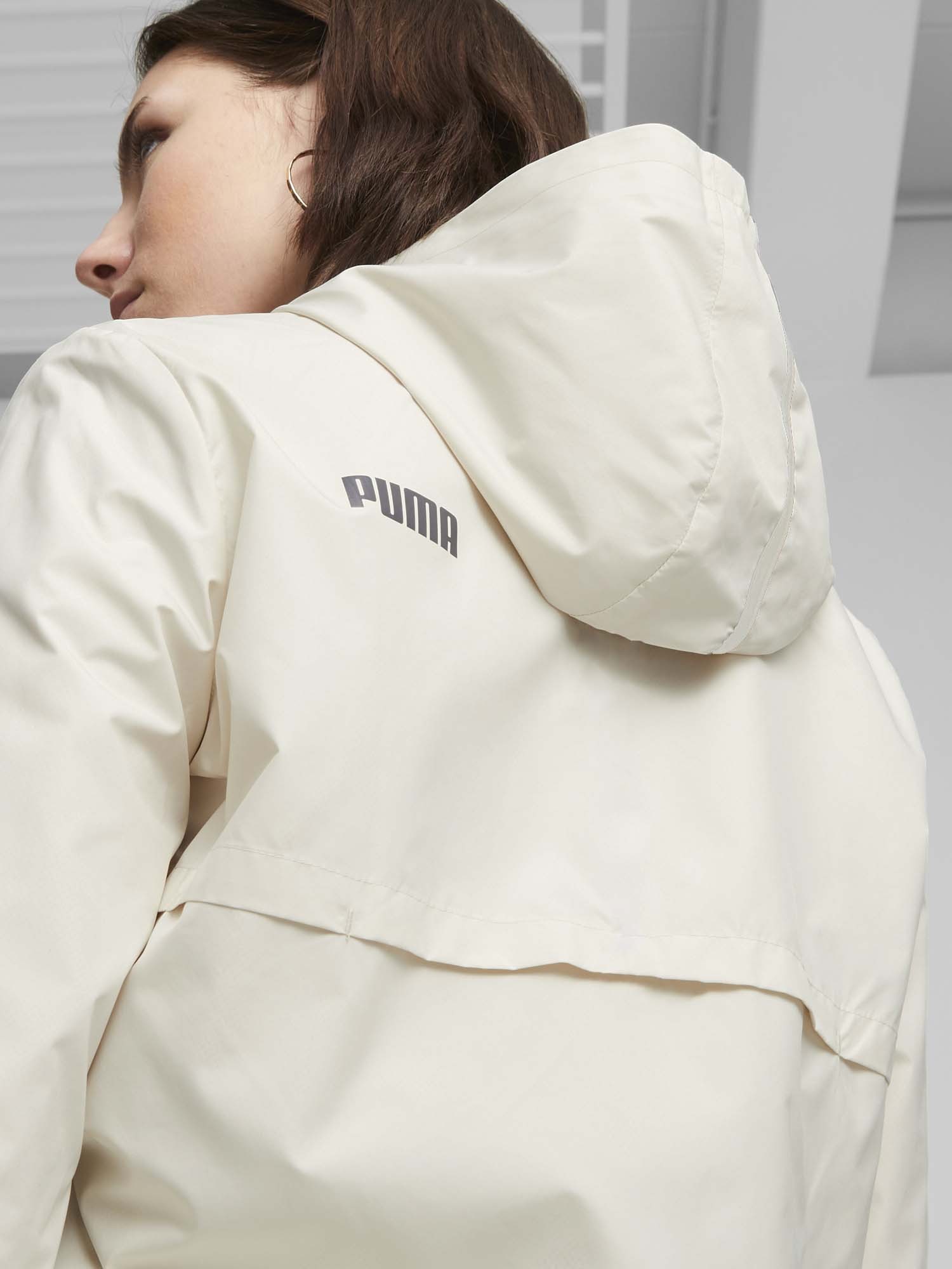 Ветровка женская Puma ESS Solid Windbreaker молочная 84749487 изображение 4