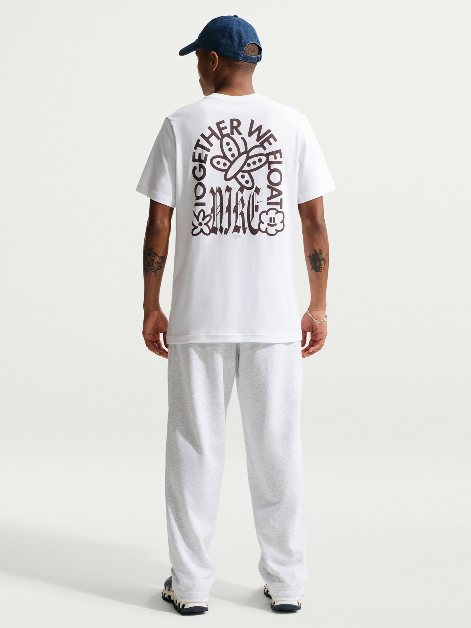 Футболка мужская Nike U NSW TEE STD WE FLOAT белая IH1139-100 изображение 6