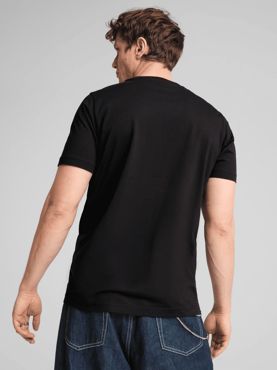 Футболка чоловіча Puma GRAPHICS Puma Wording Tee чорна 68482501 — фото 3