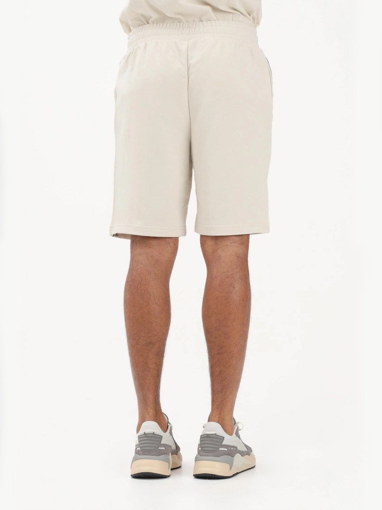 Шорты мужские Puma ESS TAPE Shorts 9'' TR молочные 69169687 изображение 4
