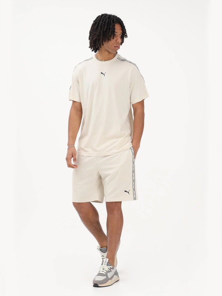 Шорты мужские Puma ESS TAPE Shorts 9'' TR молочные 69169687 изображение 5