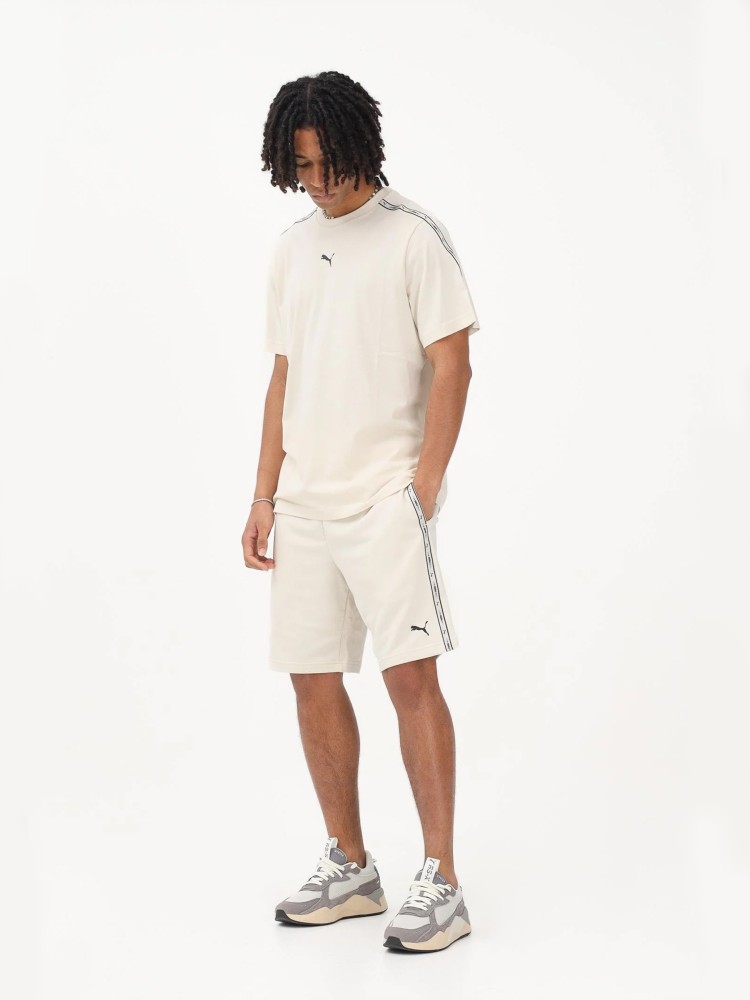 Шорты мужские Puma ESS TAPE Shorts 9'' TR молочные 69169687 изображение 6