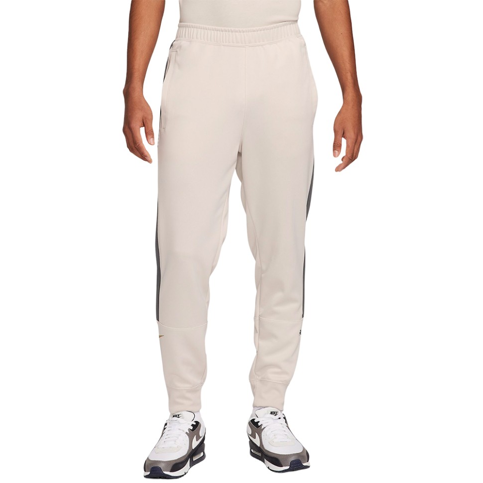 Штани чоловічі Nike M NSW SW AIR JOGGER PK бежеві FN7690-104 — фото 1