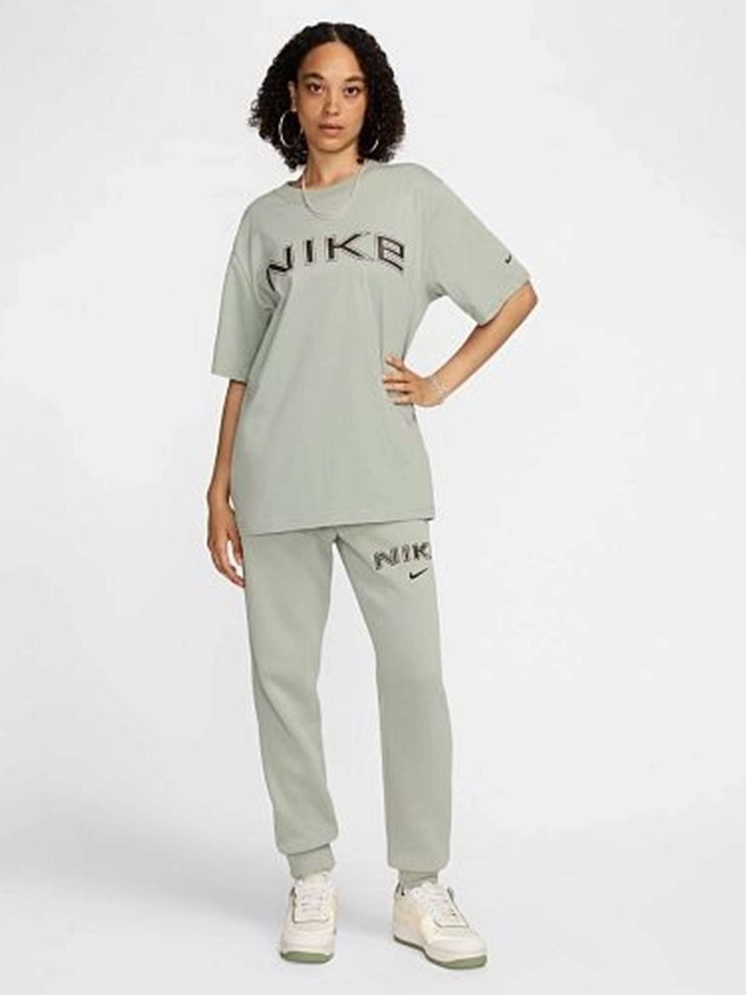 Штани жіночі Nike W NSW PHNX FLC MR STD LOGO PNT зелені HM9757-370 изображение 7