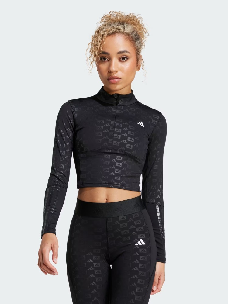 Футболка женская Adidas HYGLM 1/4ZIP Q4 черная IK5501 изображение 3