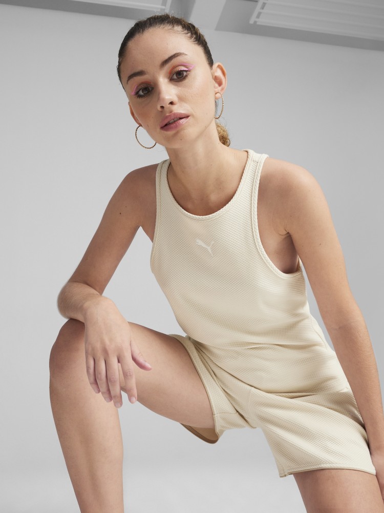 Майка жіноча Puma HER Tank Top молочна 67870087 изображение 2