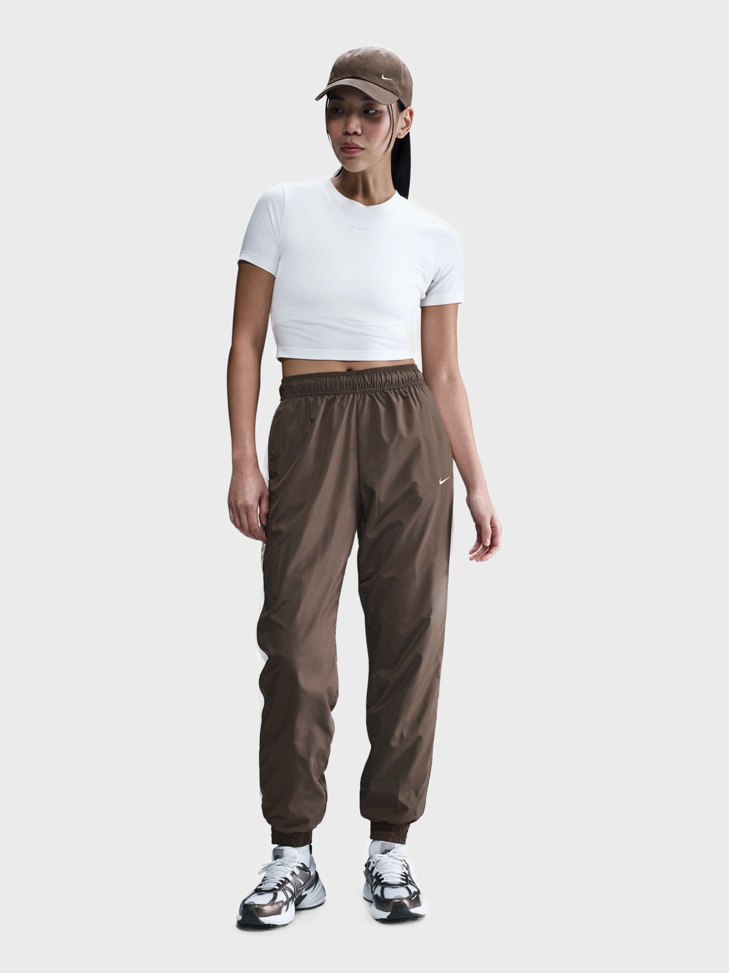 Штани жіночі Nike W NSW OTG UV ESSNTL WVN MR JG коричневі FV7660-004 изображение 2