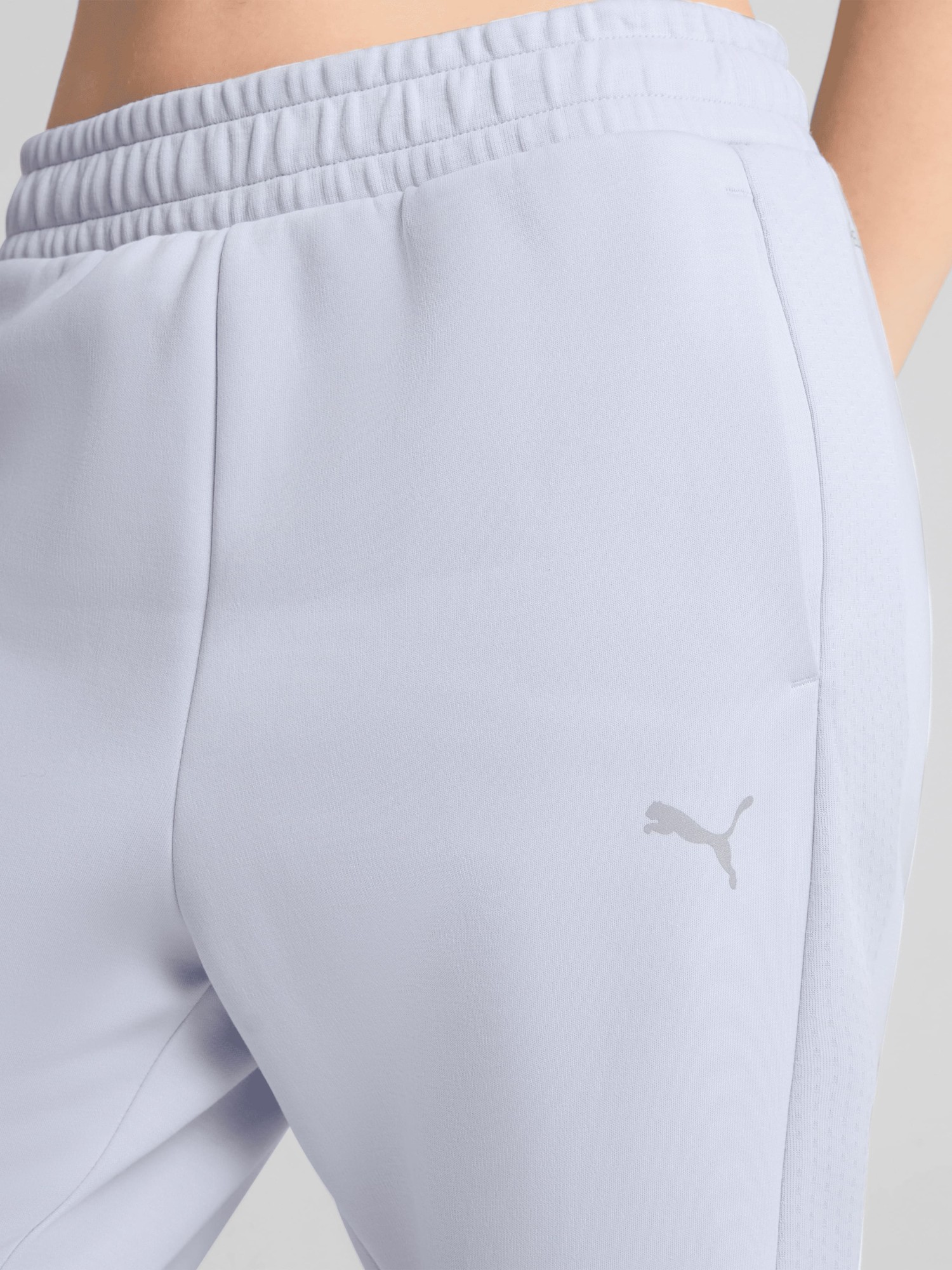 Штани жіночі Puma EVOSTRIPE Sweatpants блакитні 68505147 изображение 6