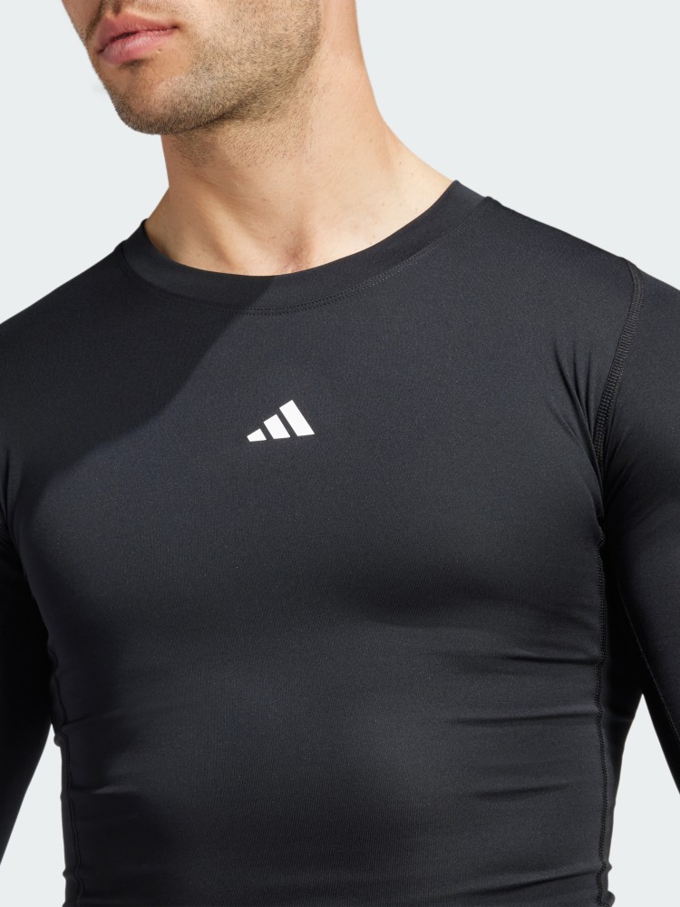 Футболка чоловіча Adidas TF LS TEE чорна JE6702 изображение 4