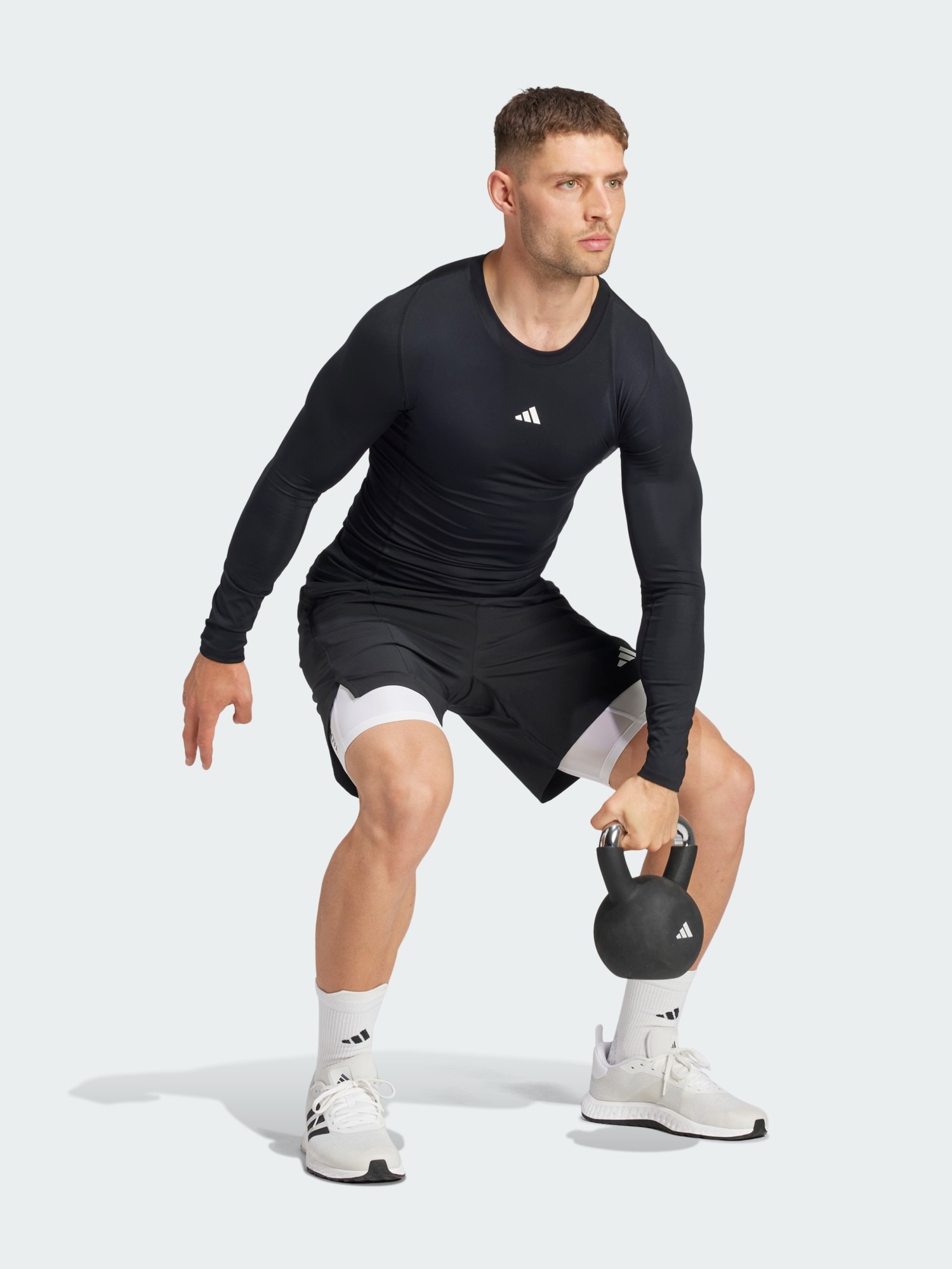 Футболка чоловіча Adidas TF LS TEE чорна JE6702 изображение 6