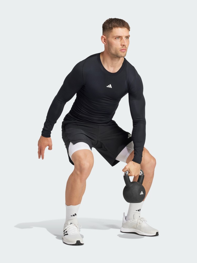 Футболка чоловіча Adidas TF LS TEE чорна JE6702 изображение 6