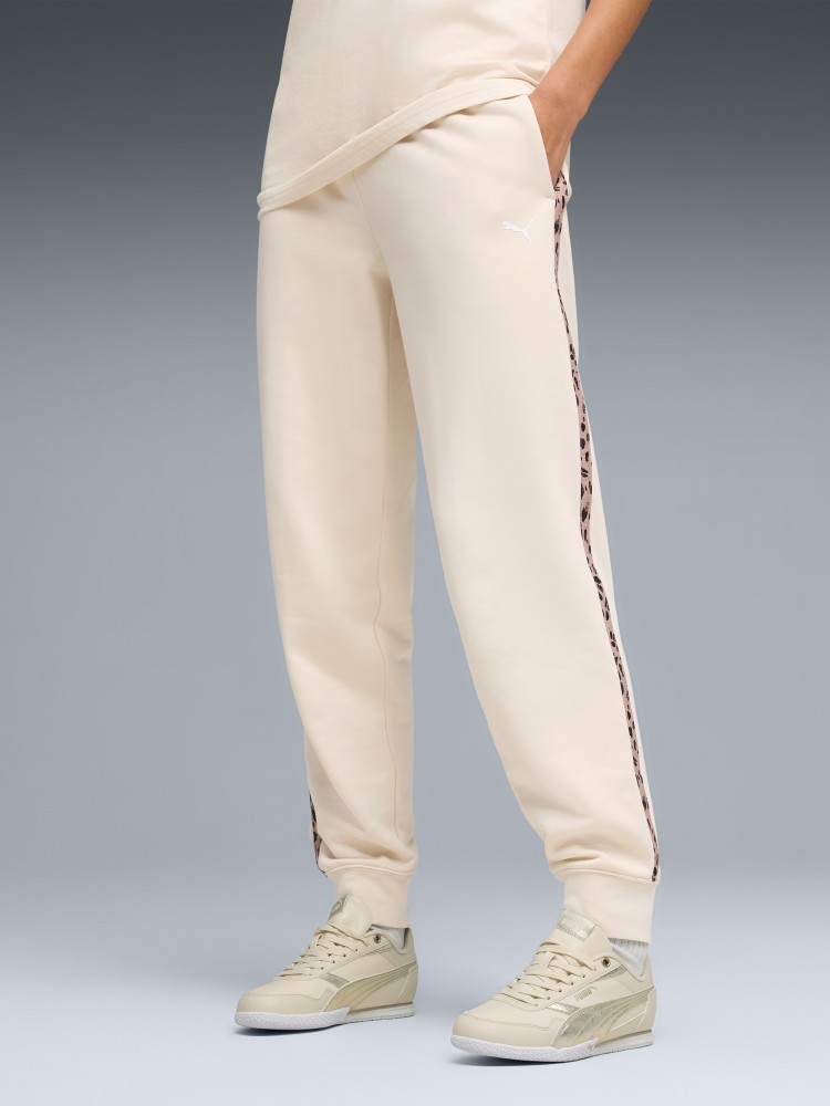 Брюки женские Puma ESS GRAPHIC Animal Comfort Pants TR cl молочные 69246487 изображение 2