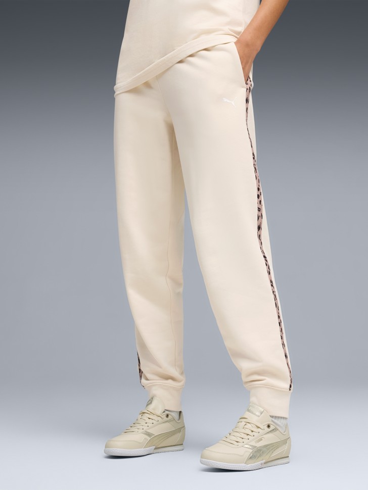 Брюки женские Puma ESS GRAPHIC Animal Comfort Pants TR cl молочные 69246487 изображение 2