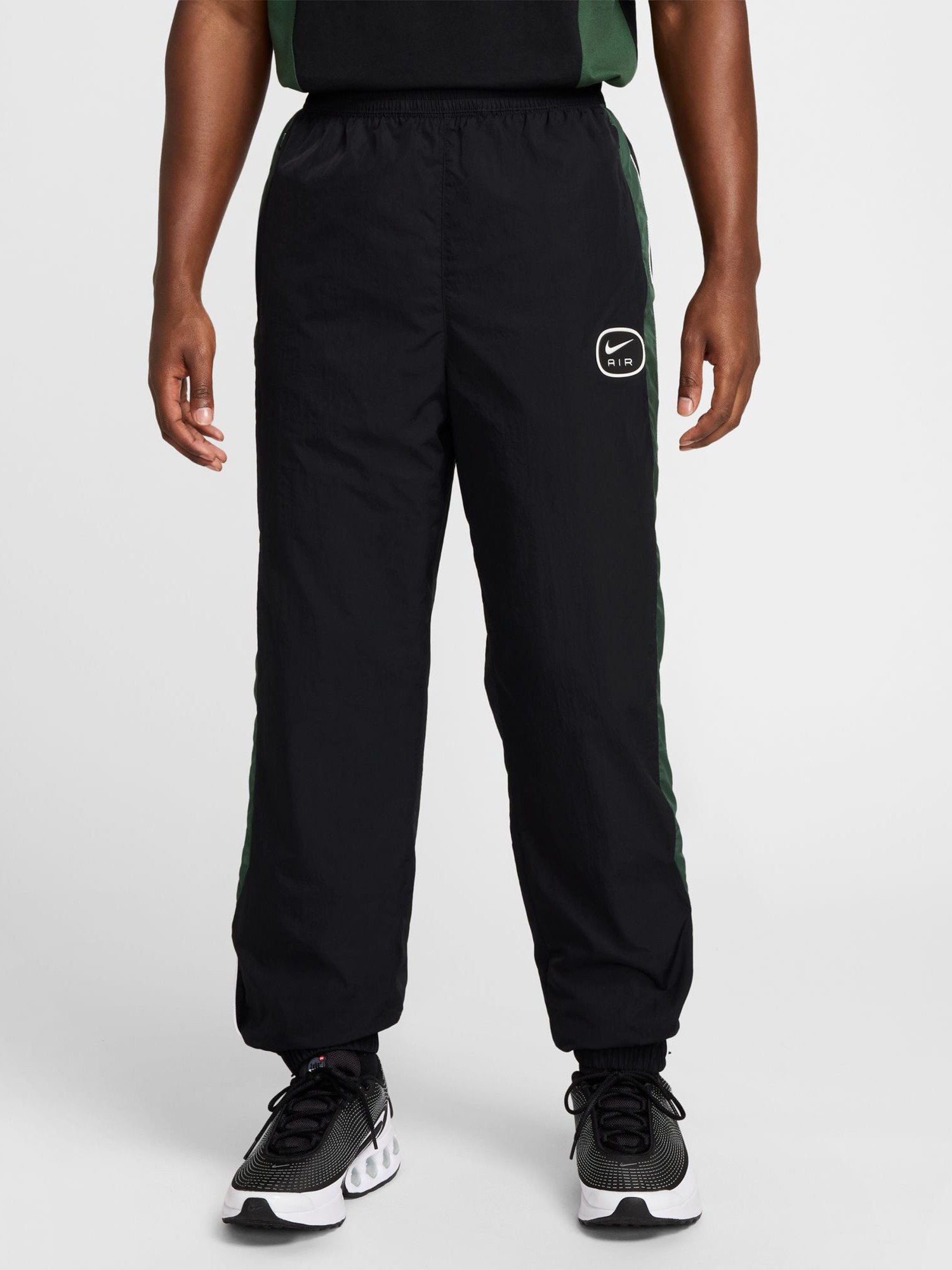 Штани чоловічі Nike M NSW SW AIR PANT WV чорні HM0170-011 изображение 2